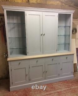 Cupboard / Sideboard- shelves & cupboard over 4 drawers over cupboards