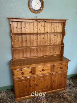 Wooden large cupboard unit with free standing display unit on top
